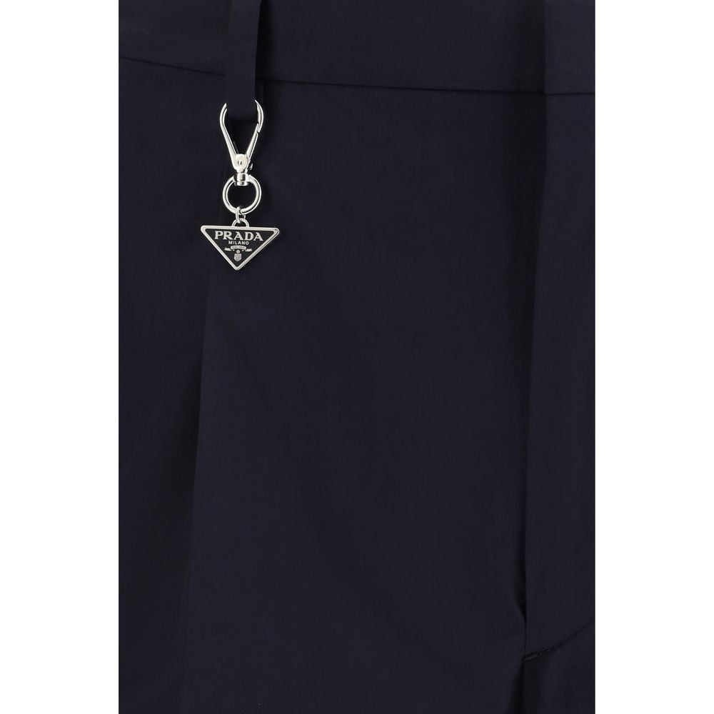 Trousers by Prada for men in cotton blue features a sculptural silhouette, showcasing a sculptural regular-fit and long with a sophisticated for a sculptural finish.