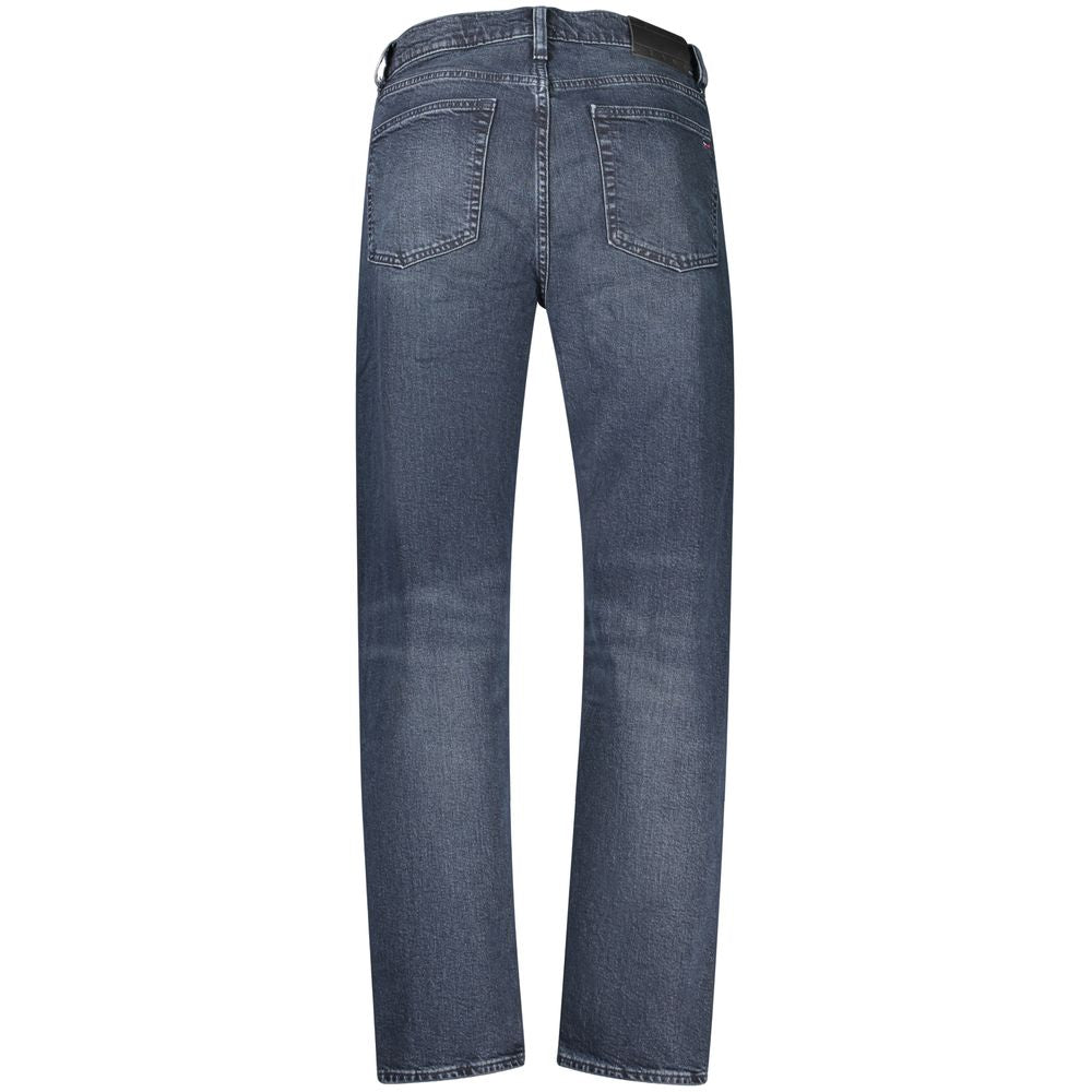 Jeans by Tommy Hilfiger for men in stretch denim cotton blue features a polished silhouette with a polished tapered-leg & regular-fit, reaching a polished long and finished with a polished .