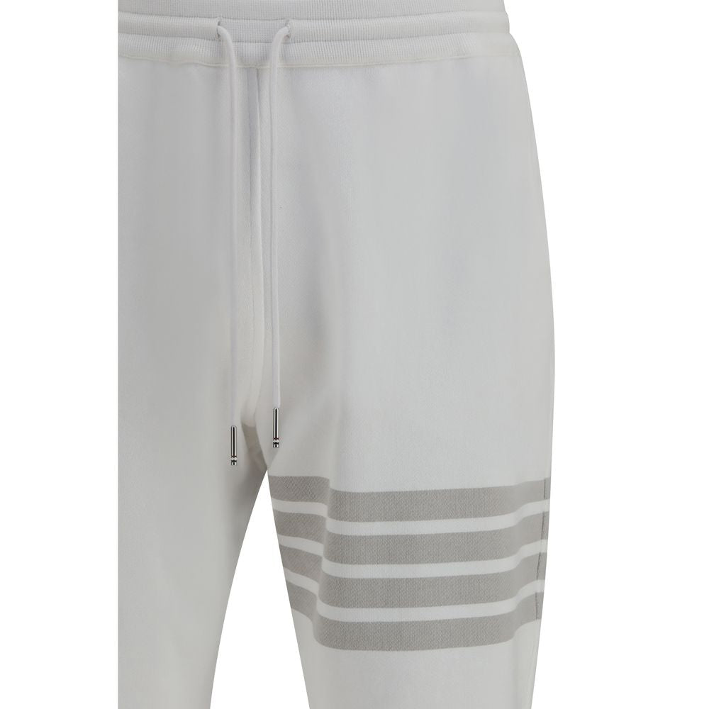 Jogger Sweatpants by Thom Browne for men in cotton white & striped features an sporty regular-fit with a and long, showcasing sporty .