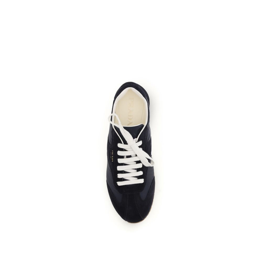 Sneakers by Prada for men in bos taurus suede calf leather blue features an versatile design from the Men's Low Top Bos Taurus Suede Calf Leather Sneakers collection, highlighting a versatile low-top style for a premium, high-fashion look.