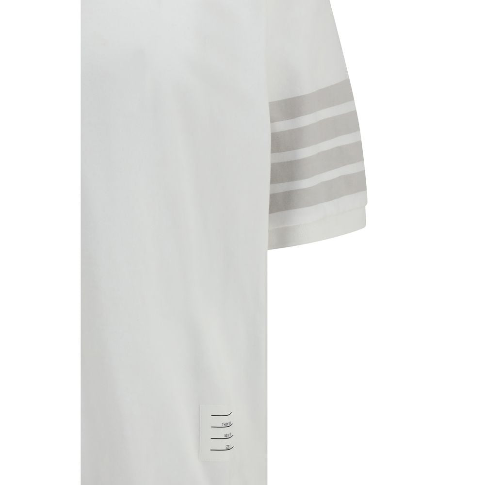 Polo Shirt by Thom Browne for men in cotton white, signature & striped presents a crisp silhouette, artfully detailed with a crisp and crisp .