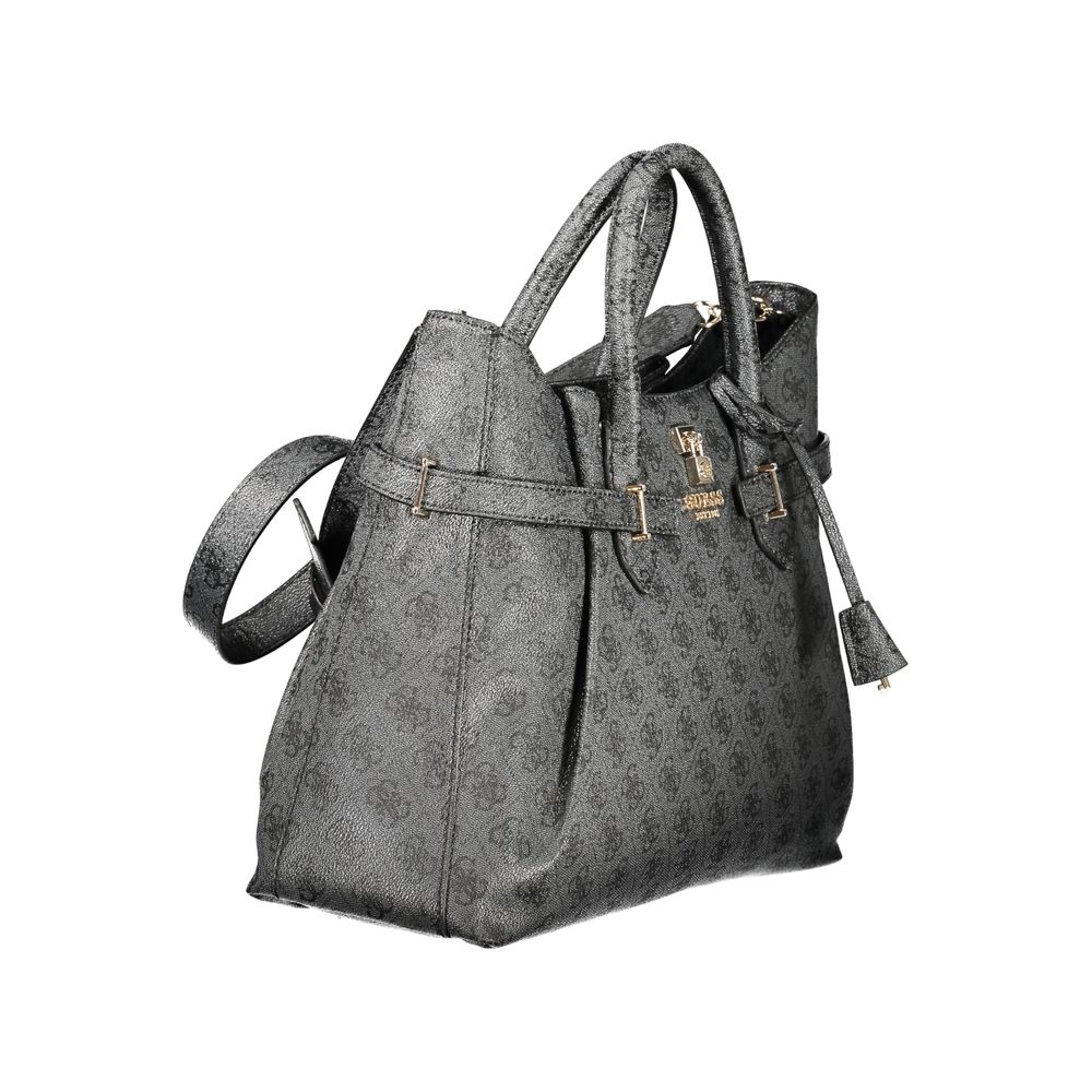 Handbag by Guess Jeans for women in polyurethane black features an refined silhouette, showcasing a secure snap & zipper, ample external-pockets & internal-pockets, and versatile shoulder-strap, handle & adjustable-strap for a sophisticated refined aesthetic.