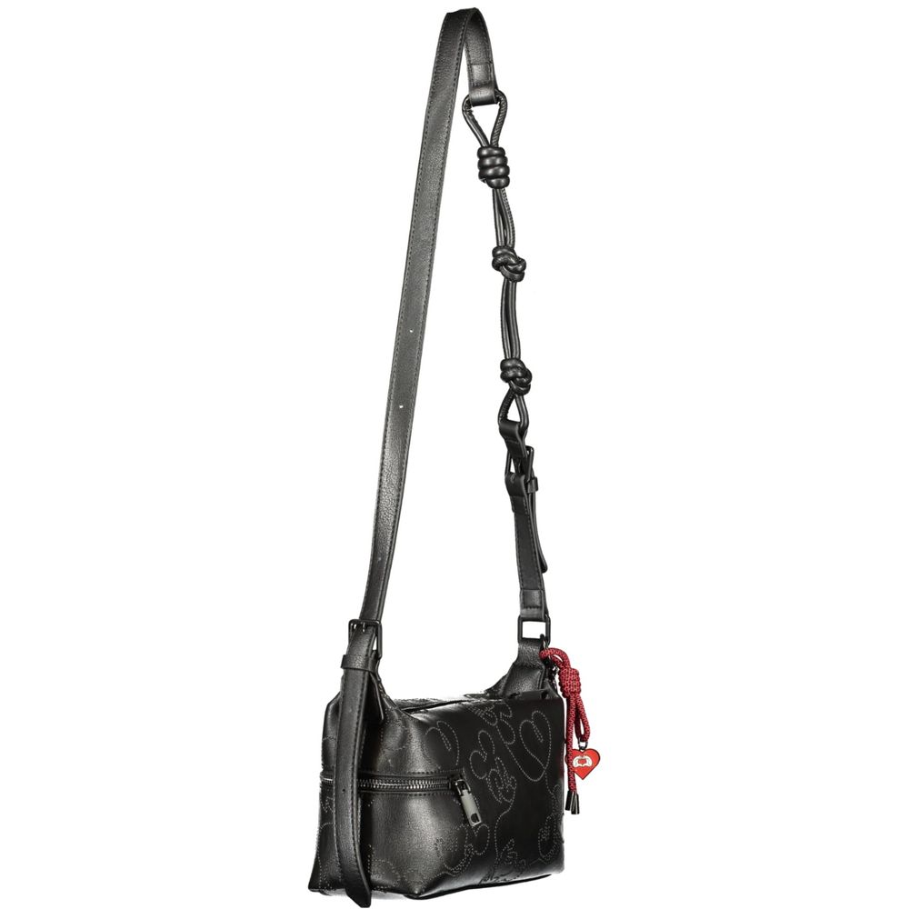This Handbag by Desigual for women in polyurethane and black, patterned & signature presents a sculptural silhouette featuring a secure , ample , and versatile for a sculptural finish.