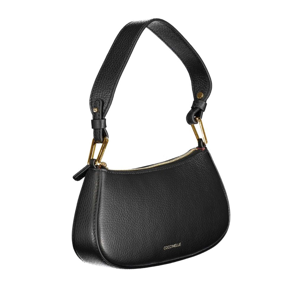 Handbag by Coccinelle for women in leather black features a refined silhouette, showcasing a secure zipper, organized , and versatile shoulder-strap, adjustable-strap & handle for a refined finish.