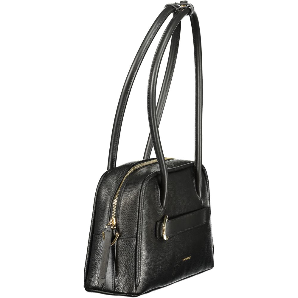 Evening Handbag by Coccinelle for women in leather black presents a ornamental silhouette, showcasing a secure , ample , and versatile for a ornamental finish.