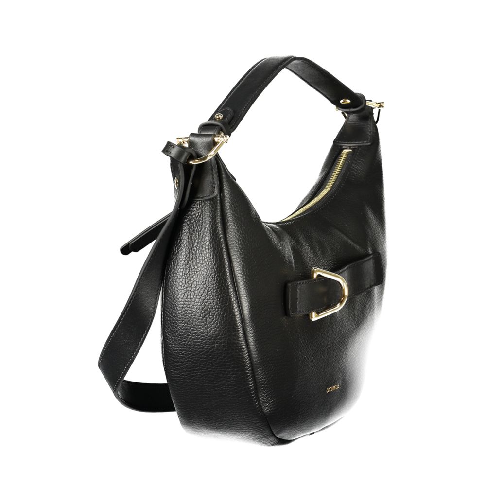 Handbag by Coccinelle for women in leather black features a ornamental silhouette, showcasing a secure , ample , and ornamental for a sophisticated look.