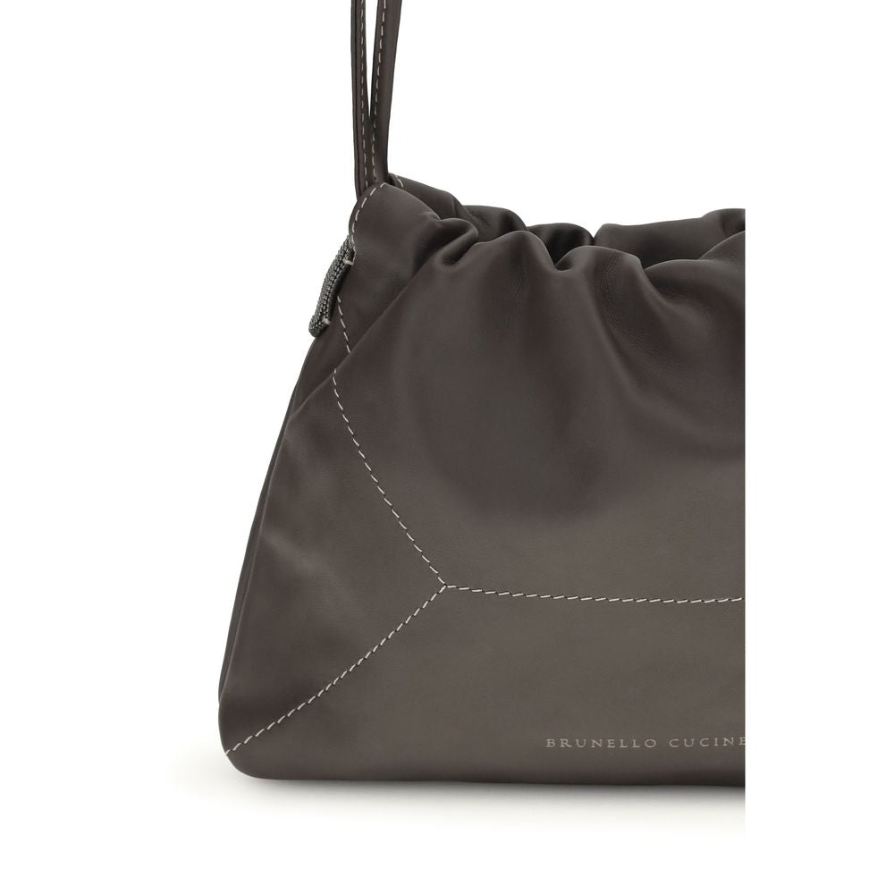 Shoulder Drawstring Bag by Brunello Cucinelli for women in bos taurus calf leather brown presents a statuesque silhouette, showcasing a secure drawstring and statuesque with versatile shoulder-strap for a sophisticated look.