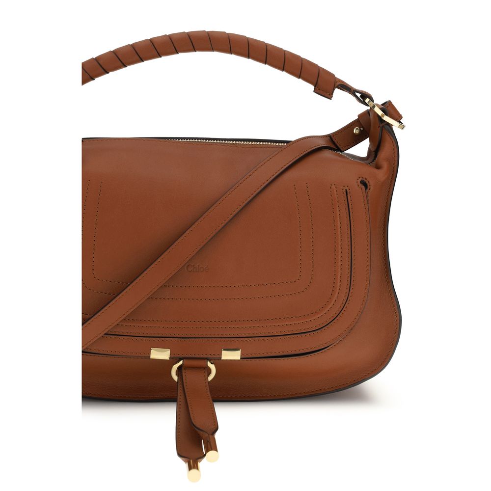 Small Shoulder Flap Bag by Chloé for women in bos taurus calf leather brown features a effortless sophistication silhouette, secured by a flap & zipper with ample external-pockets and versatile shoulder-strap & adjustable-strap for a effortless sophistication finish.