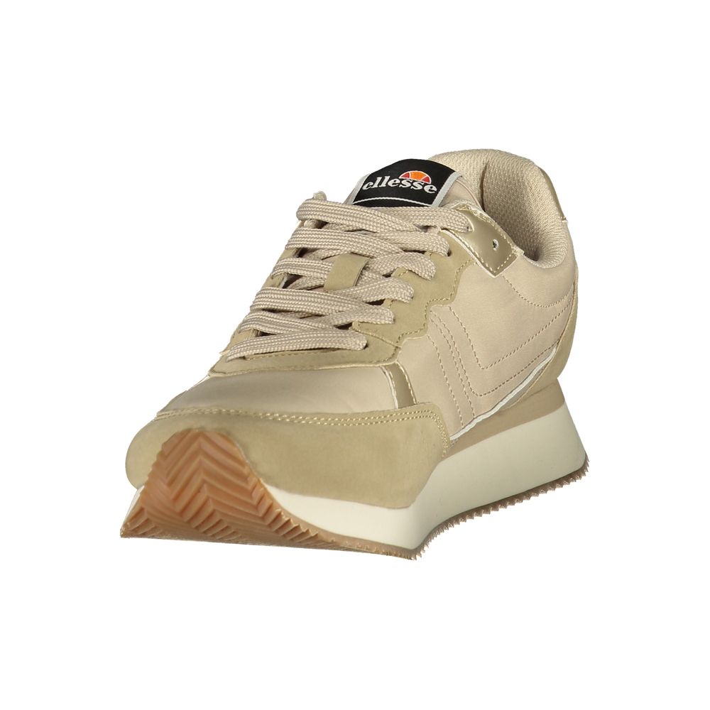 Athletic Sneakers by Ellesse for women in polyester & polyurethane beige & gold features an stately silhouette, showcasing the signature athletic style of the Women's Athletic Polyester & Polyurethane Sneakers collection with a truly stately finish.