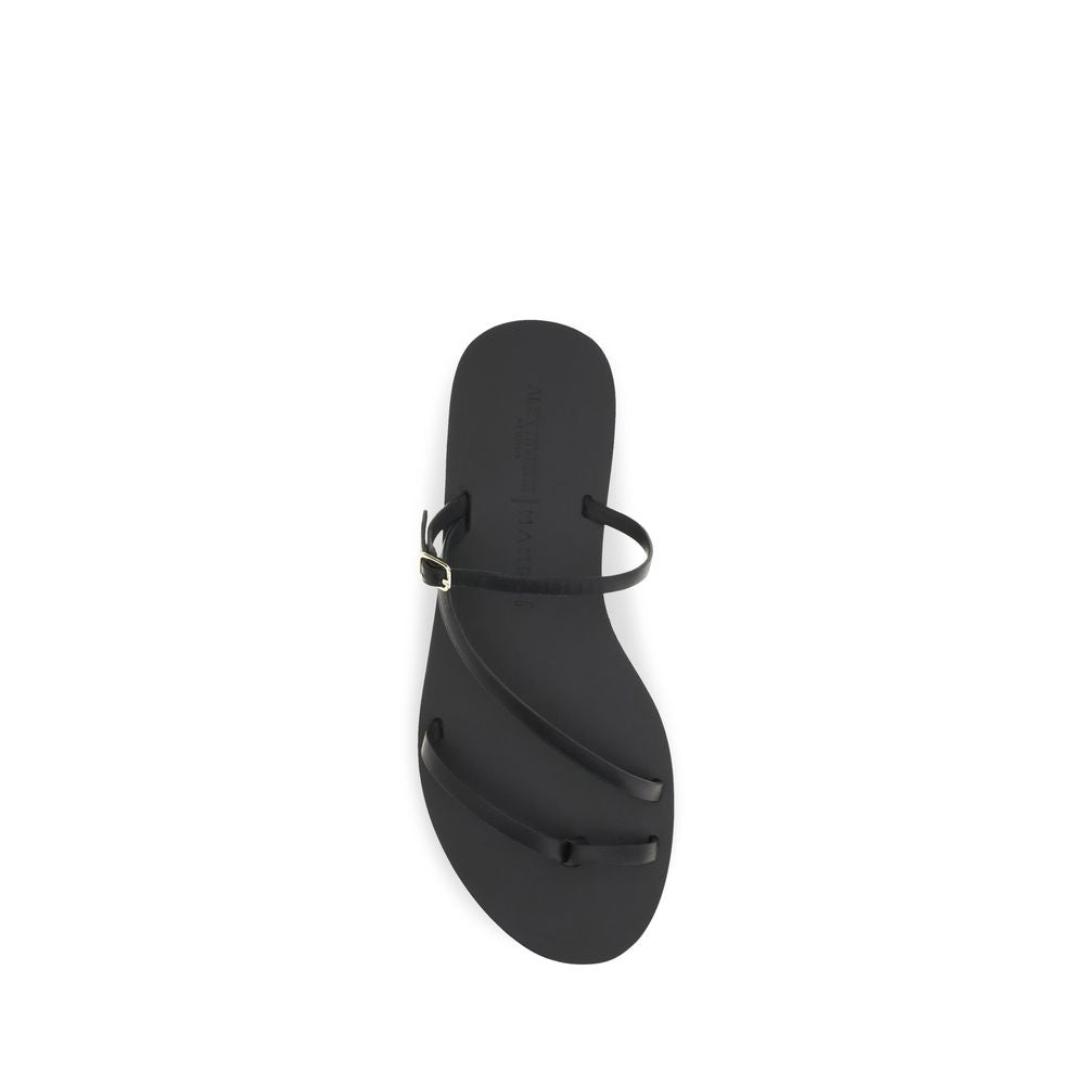 Flat Sandals by Manebi for women in bos taurus calf leather black & natural features an statuesque Women's Bos Taurus Calf Leather Flat Sandals silhouette with a refined flat and elegant .