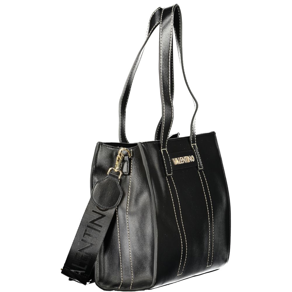 This Evening Handbag by Mario Valentino for women in polyurethane and black presents a sculptural silhouette featuring a secure , ample , and versatile for a sculptural finish.