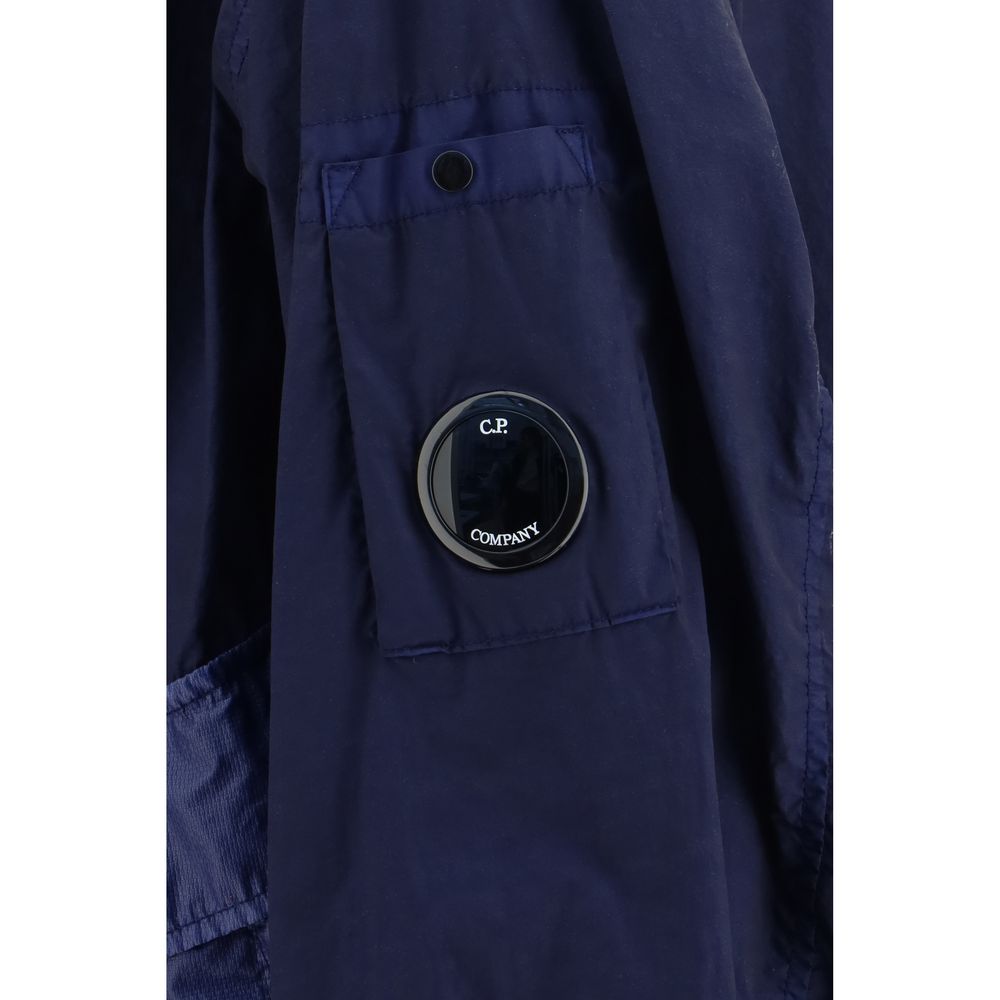 Bomber Jacket by C.P. Company for men in nylon polyamide polyurethane & velour blue features a city-ready silhouette, detailed with pockets and a city-ready .