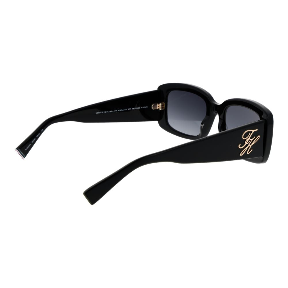 Sunglasses by Tommy Hilfiger for women in acetate and black featuring an opulent rectangle full-rim frame design with a sophisticated black coloured frame finish and high-performance gradient category-3-dark-tint lens.