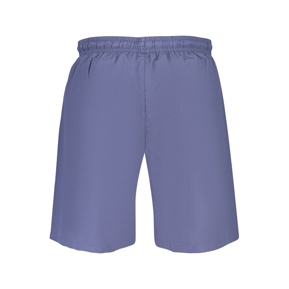 Swim Shorts by Fila for men in polyester blue & print features an dramatic silhouette that defines the luxurious aesthetic and refined cut of the Men's Polyester Swim Shorts.