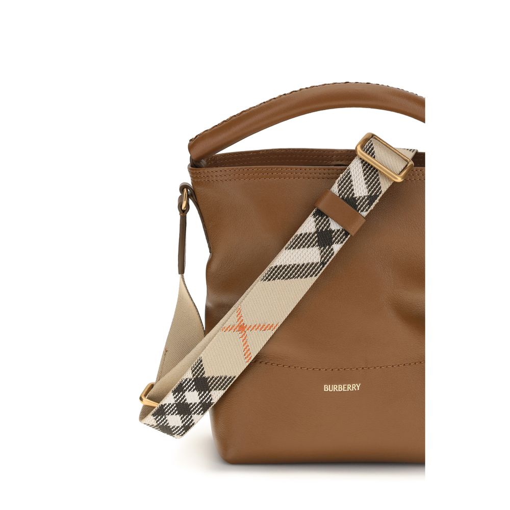 Bucket Handbag by Burberry for women in bos taurus calf leather brown & patterned features an sun-drenched silhouette, showcasing a secure clip, ample , and versatile adjustable-strap & detachable-strap for a truly sun-drenched finish.