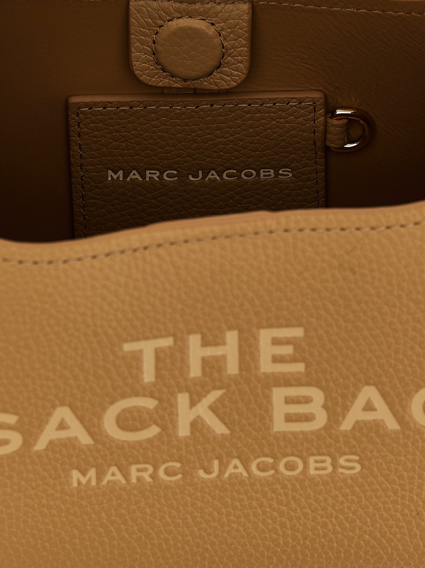 Mini Pouch Clutch Handbag by Marc Jacobs for women in bos taurus calf suede leather beige presents a ornamental silhouette, showcasing a secure magnetic, ample , and versatile handle for a ornamental finish.