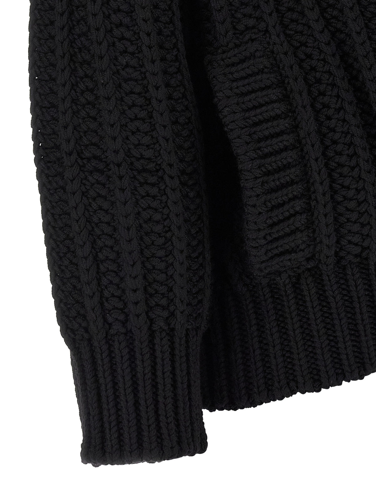 Cardigan by Dolce & Gabbana for women in virgin wool black features a dramatic silhouette, showcasing a sophisticated and dramatic detail for a timeless, premium look.