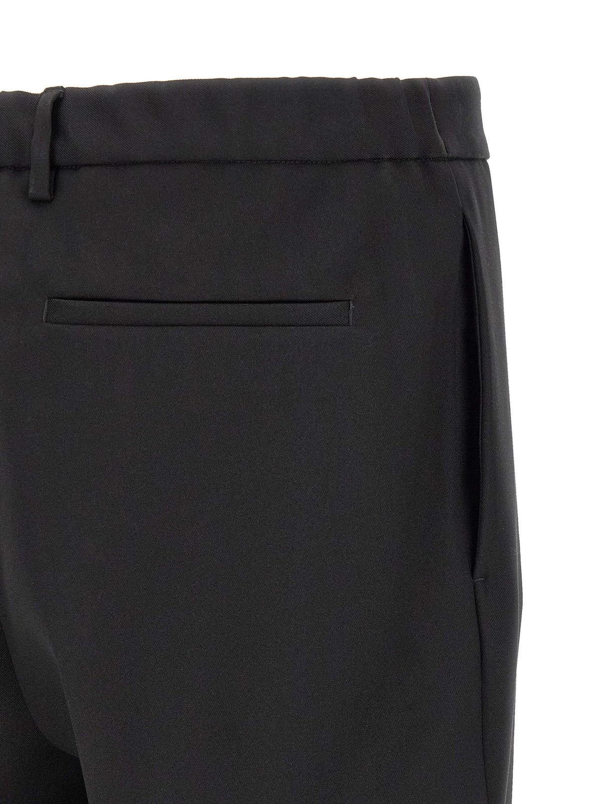 Trousers by Jil Sander for men in polyester black presents a perennial silhouette, meticulously tailored with a tapered-leg, relaxed-fit & cropped cut, long cropped finish, and an elegant .
