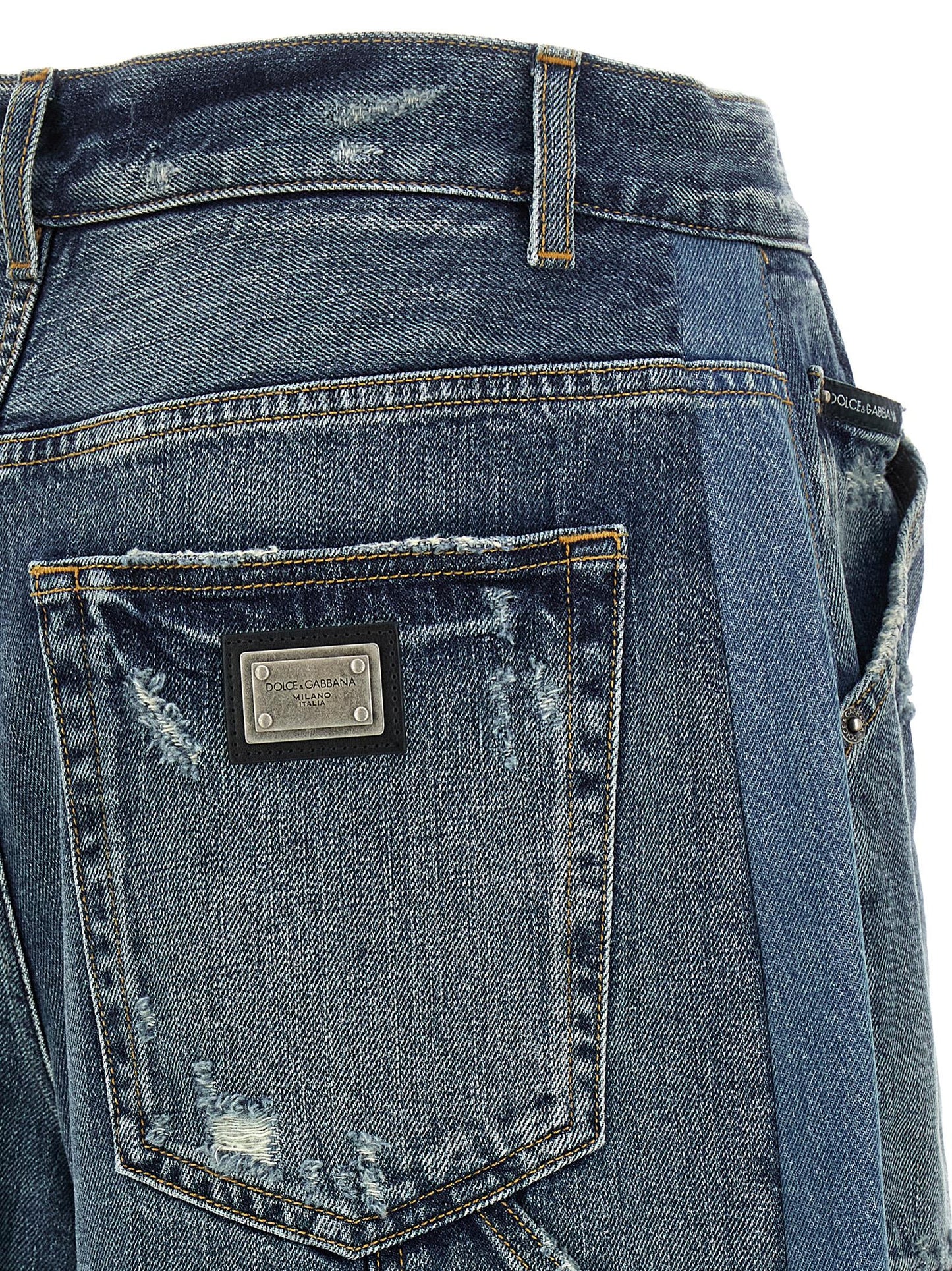 Denim Shorts by Dolce & Gabbana for women in denim cotton blue & patchwork features an utilitarian chic flared & wide with a short and , creating a utilitarian chic silhouette perfect for elevated casual styling.