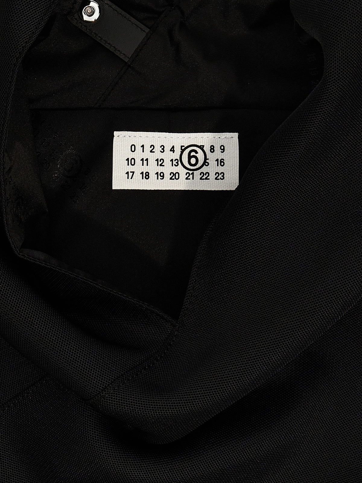 Shoulder Bag by MM6 Maison Margiela for women in polyester black & signature presents a versatile silhouette, showcasing a secure and versatile with versatile shoulder-strap for a sophisticated look.