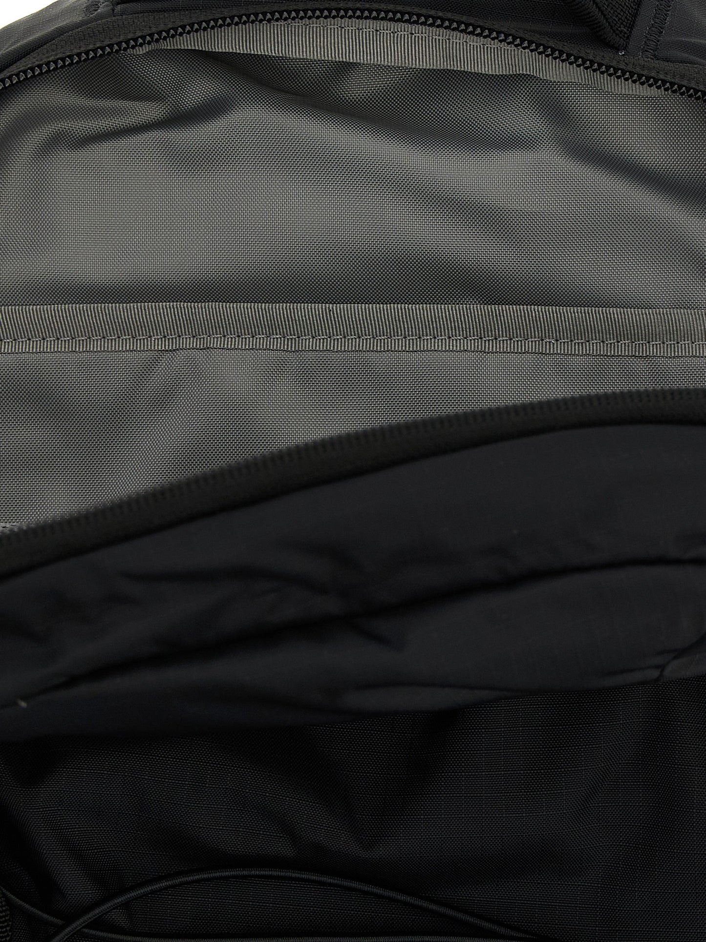 Mini Backpack by The North Face for unisex in plush nylon black features a effortlessly chic Borealis Plush Nylon Mini Backpack design, showcasing a secure , ample , and versatile backpack-strap & adjustable-strap for a effortlessly chic finish.