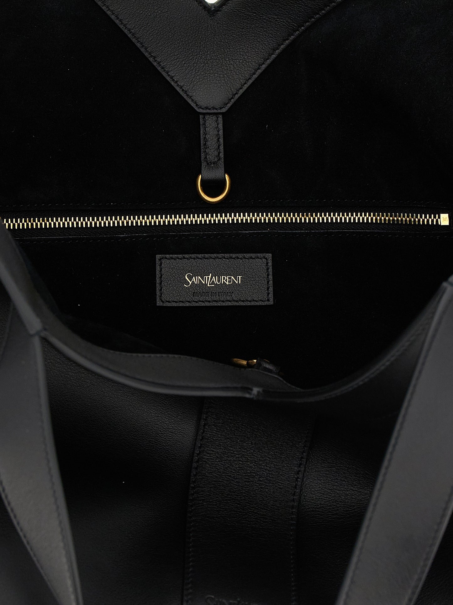 Small Tote Bag by Saint Laurent for women in suede calfskin leather black features an metropolitan chic Essence Suede Calfskin Leather Small Tote Bag design with a secure snap, metropolitan chic , and versatile handle for a metropolitan chic look.
