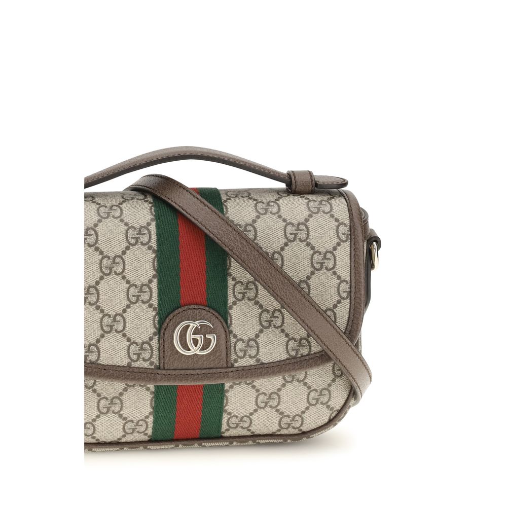 Small Flap Handbag by Gucci for women in leather beige, gold, monogram & striped features a signature silhouette, showcasing a secure flap & magnetic and signature with versatile shoulder-strap, handle, adjustable-strap & detachable-strap for a sophisticated look.