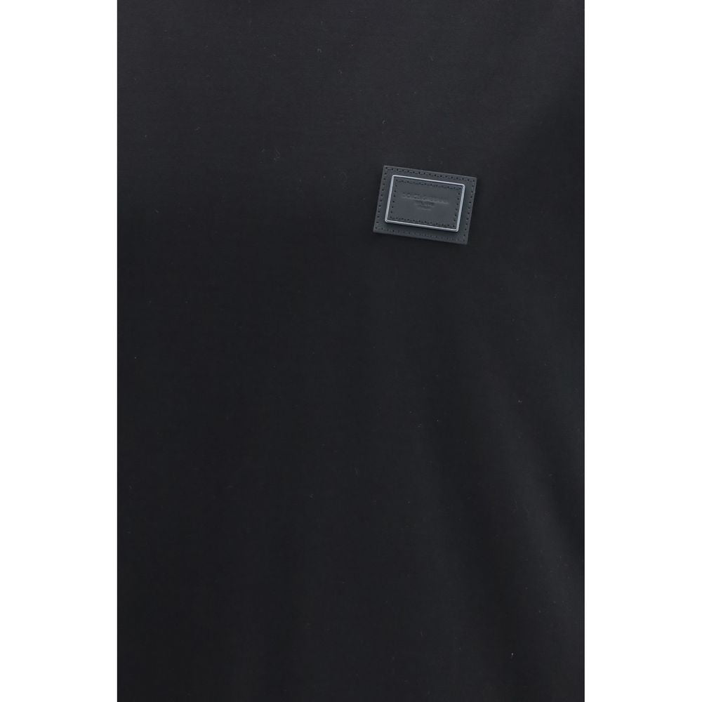 T-Shirt by Dolce & Gabbana for men in cotton black showcases a chic silhouette, artfully detailed with a chic and for a chic finish.
