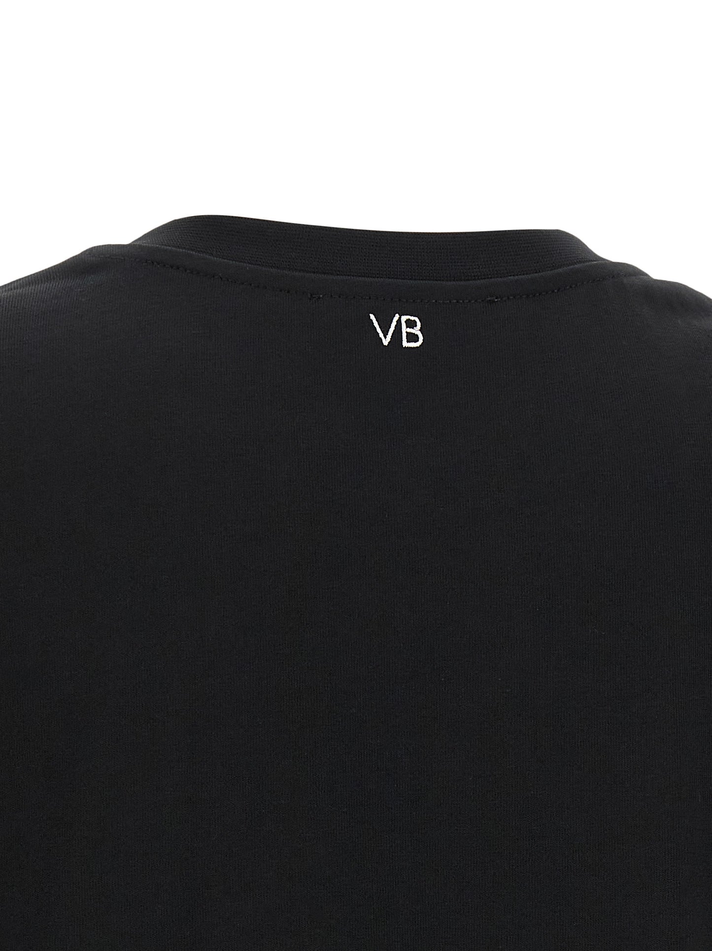 T-Shirt by Victoria Beckham for women in cotton black, white & monogram showcases a dramatic silhouette, elegantly detailed with a dramatic and for a truly dramatic finish.