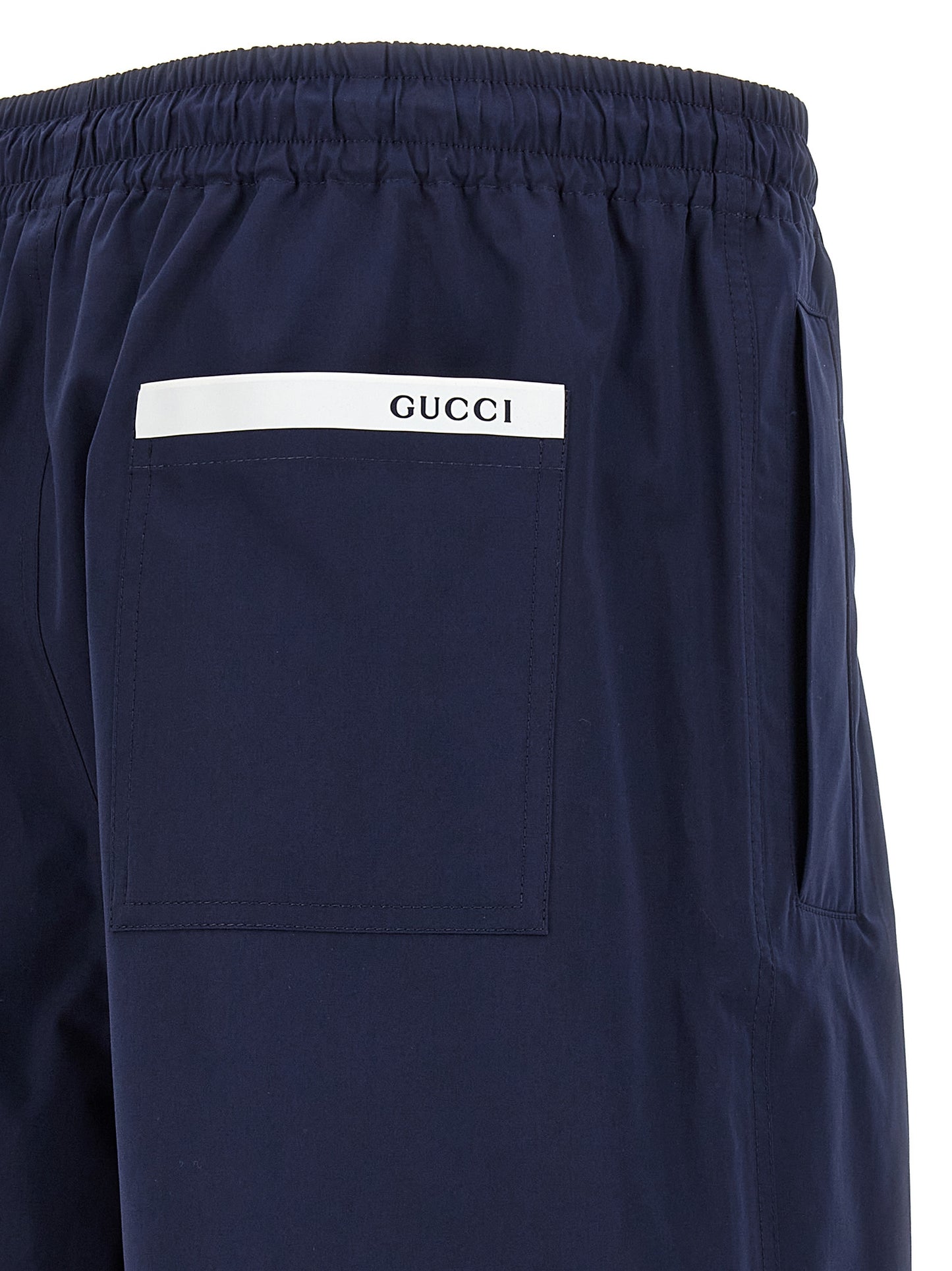 Bermuda Shorts by Gucci for men in cotton blue & signature features a sartorial silhouette, showcasing a sartorial relaxed-fit and short with a sophisticated for a sartorial look.