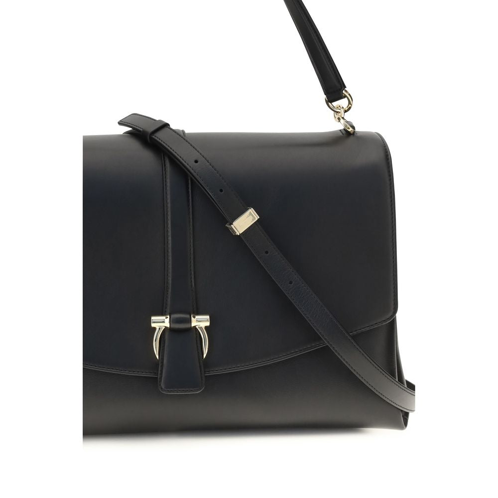 Large Shoulder Flap Clutch Bag by Ferragamo for women in bos taurus calf leather black presents a statuesque silhouette, showcasing a secure flap and statuesque with versatile shoulder-strap & handle for a sophisticated look.