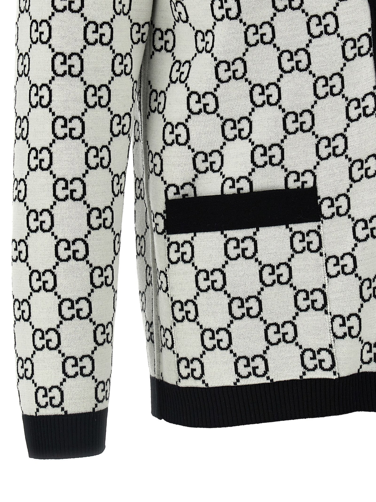 Cardigan by Gucci for women in wool bicolour, black, white & jacquard showcases a luxurious silhouette, meticulously detailed with a sophisticated and for a refined finish.