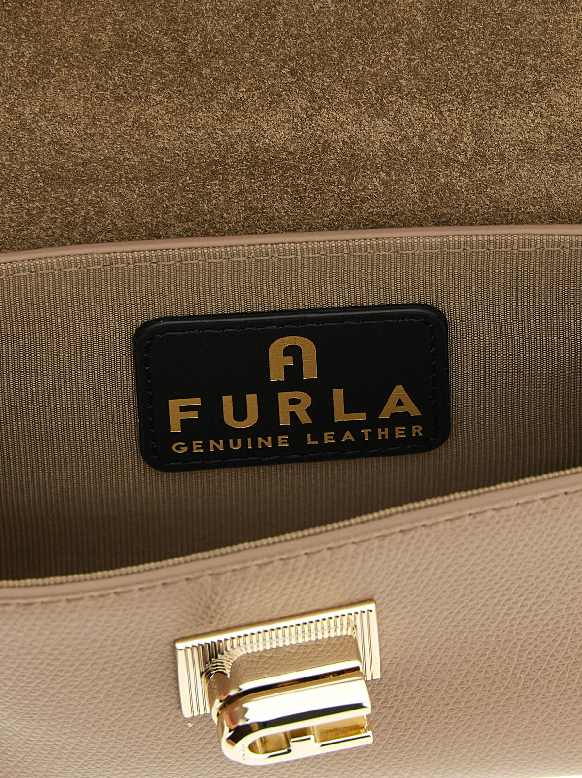 Crossbody Flap Clutch Handbag by Furla for women in calfskin leather beige features an versatile silhouette, showcasing a secure flap and versatile with versatile crossbody-strap & shoulder-strap for a versatile finish.