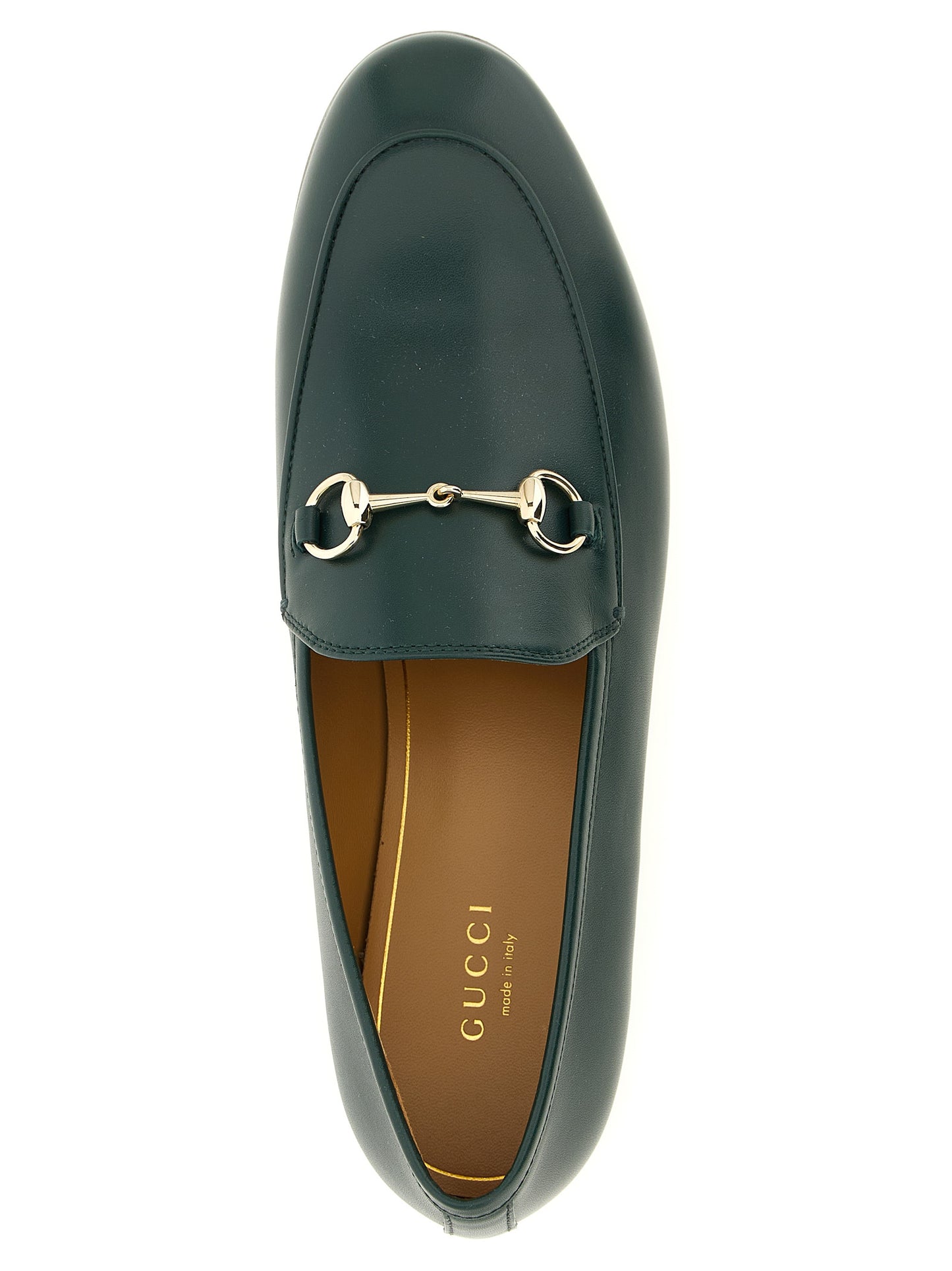 Flat Loafer Slip-On Shoes by Gucci for women in calfskin leather bicolour & green features an effortless chic silhouette, showcasing the Women's Calfskin Leather Flat Loafer Slip-On Shoes design with an effortless chic flat and a almond toe style for a effortless chic look.