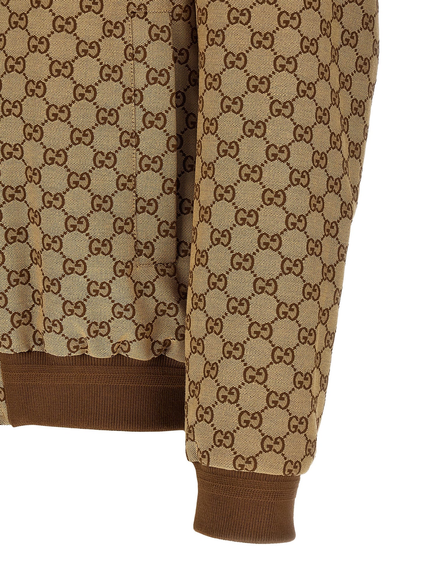 This Bomber Jacket by Gucci for men in cotton polyester beige & signature exhibits a edgy silhouette, meticulously detailed with functional pockets and a edgy for a edgy finish.