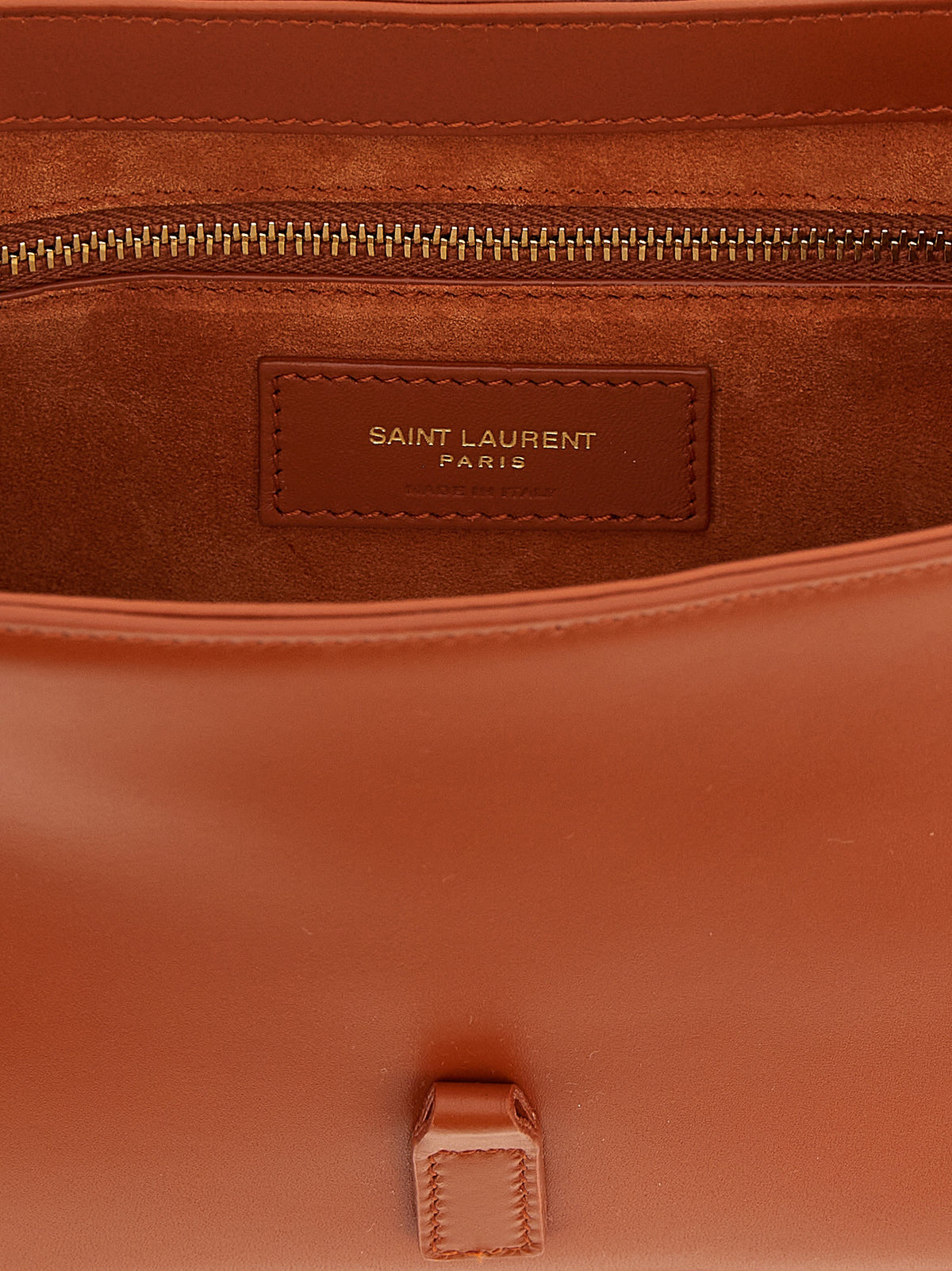 Shoulder Bag by Saint Laurent for women in suede calfskin leather orange showcases a enviable silhouette, artfully detailed with a secure , organized , and versatile shoulder-strap, adjustable-strap & handle for a enviable look.