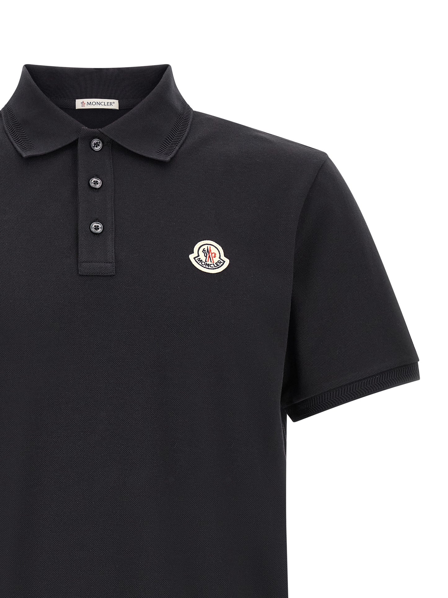 Polo Shirt by Moncler for men in cotton felt blue presents a sleek silhouette, featuring a refined and for a sleek finish.