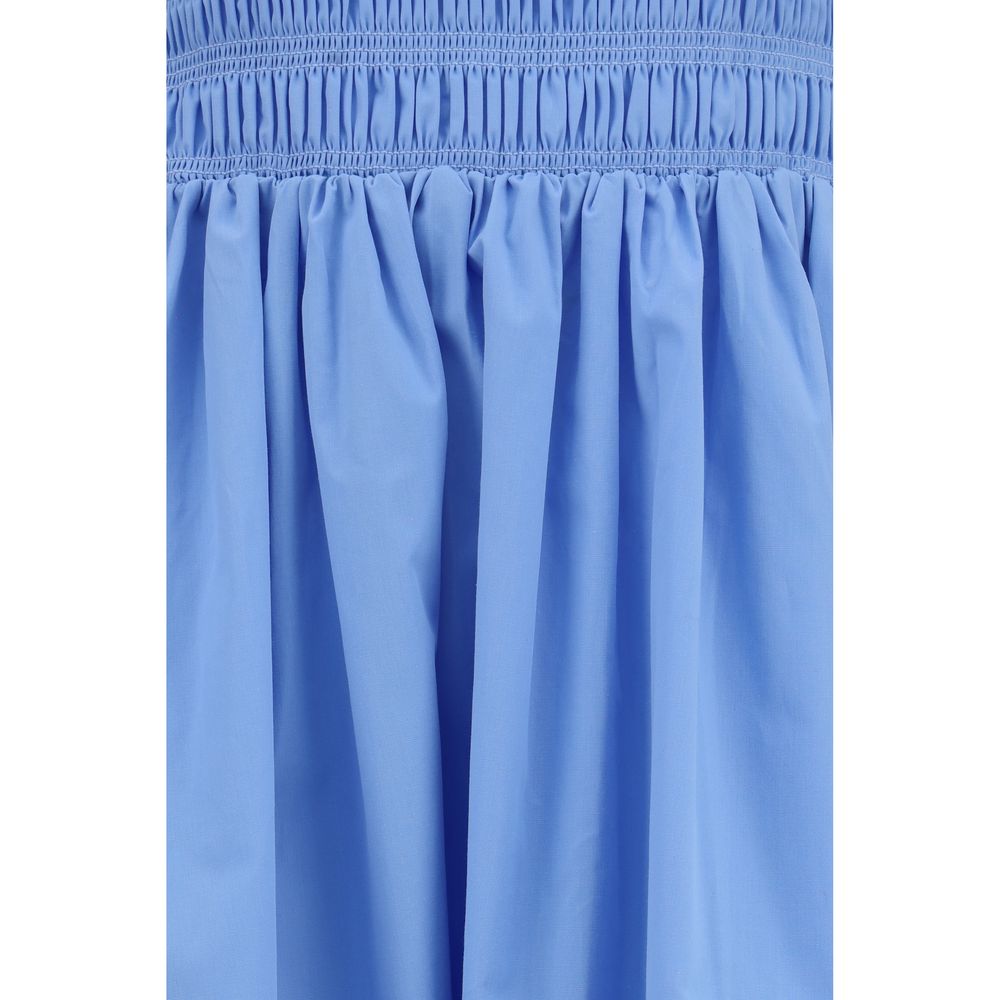Dress by Ganni for women in cotton blue & signature features an magnificent silhouette, artfully detailed with a magnificent and that flows into an magnificent maxi long.