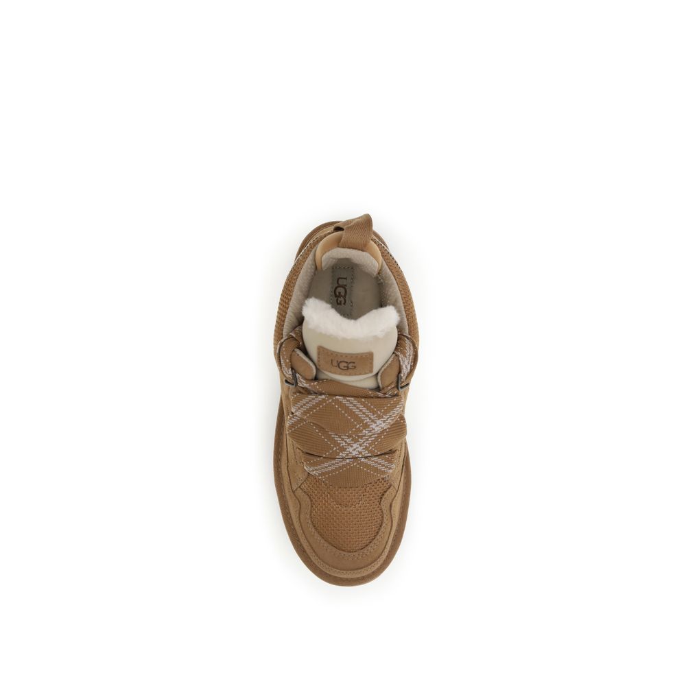 Sneakers by UGG for women in leather & fur brown & signature presents a impeccable silhouette as Women's Fashion Leather & Fur Sneakers, expertly defined by a impeccable fashion style for a impeccable, high-fashion look.