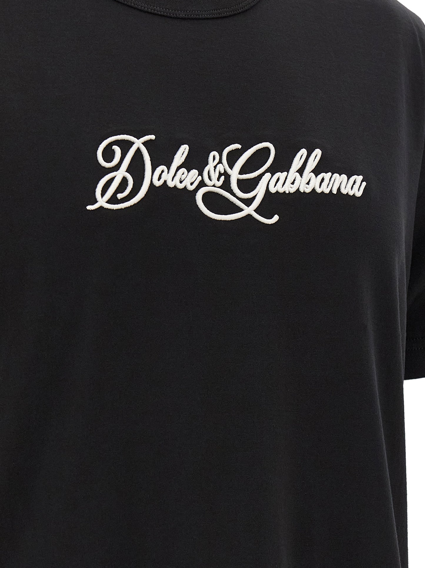 T-Shirt by Dolce & Gabbana for men in cotton black & white showcases a dramatic silhouette, elegantly detailed with a dramatic and for a truly dramatic finish.