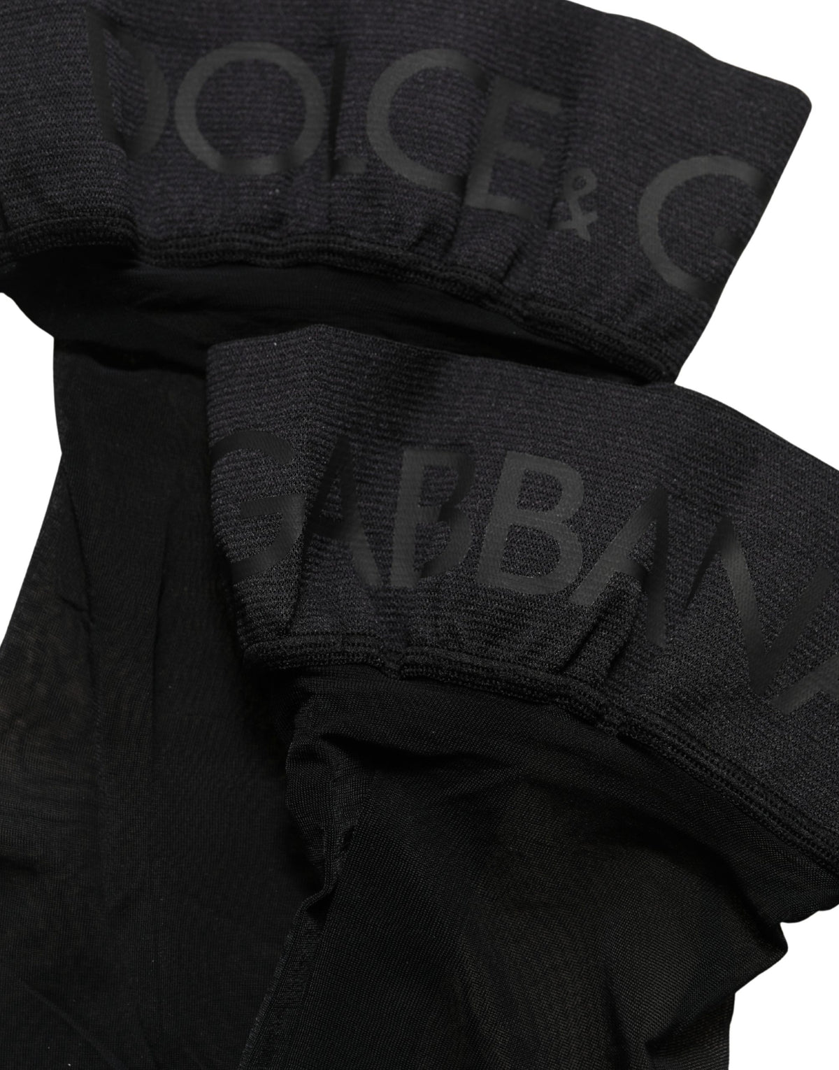 These Socks by Dolce & Gabbana for women in stretch nylon & calf leather black present a utilitarian silhouette from the Women's Stretch Nylon & Calf Leather Socks collection, offering a utilitarian fit and refined aesthetic.
