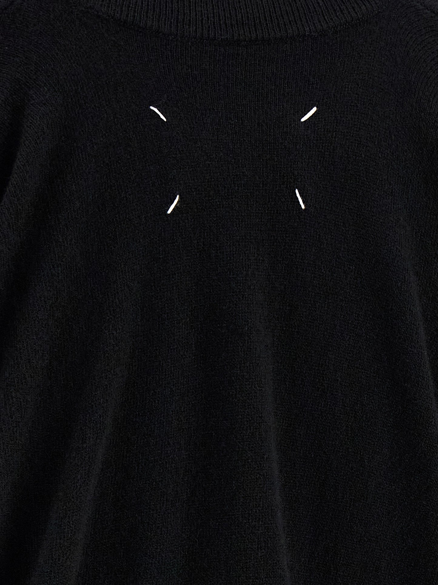 Cardigan by Maison Margiela for women in virgin wool black & signature features a dramatic silhouette, showcasing a sophisticated and dramatic detail for a timeless, premium look.