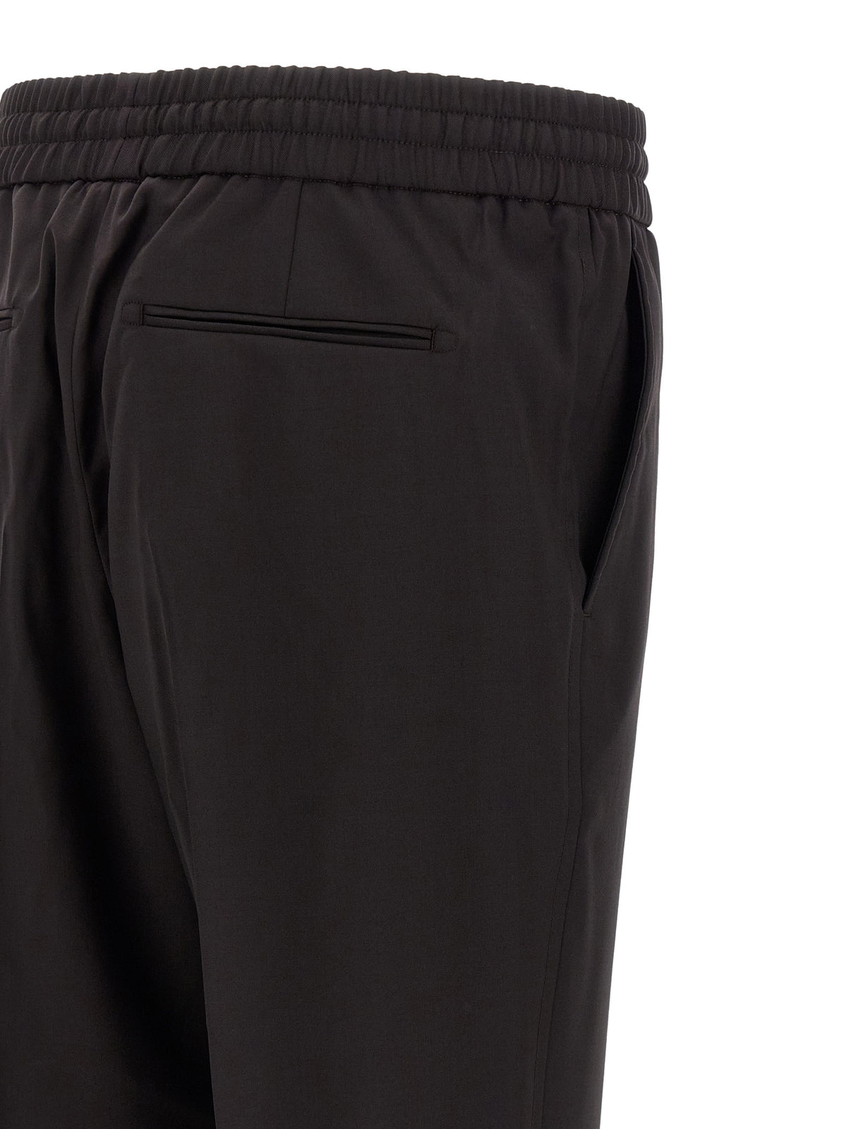 Trousers by Brioni for men in virgin wool brown features a tailored silhouette with a tailored straight, defined by its long and a sophisticated .