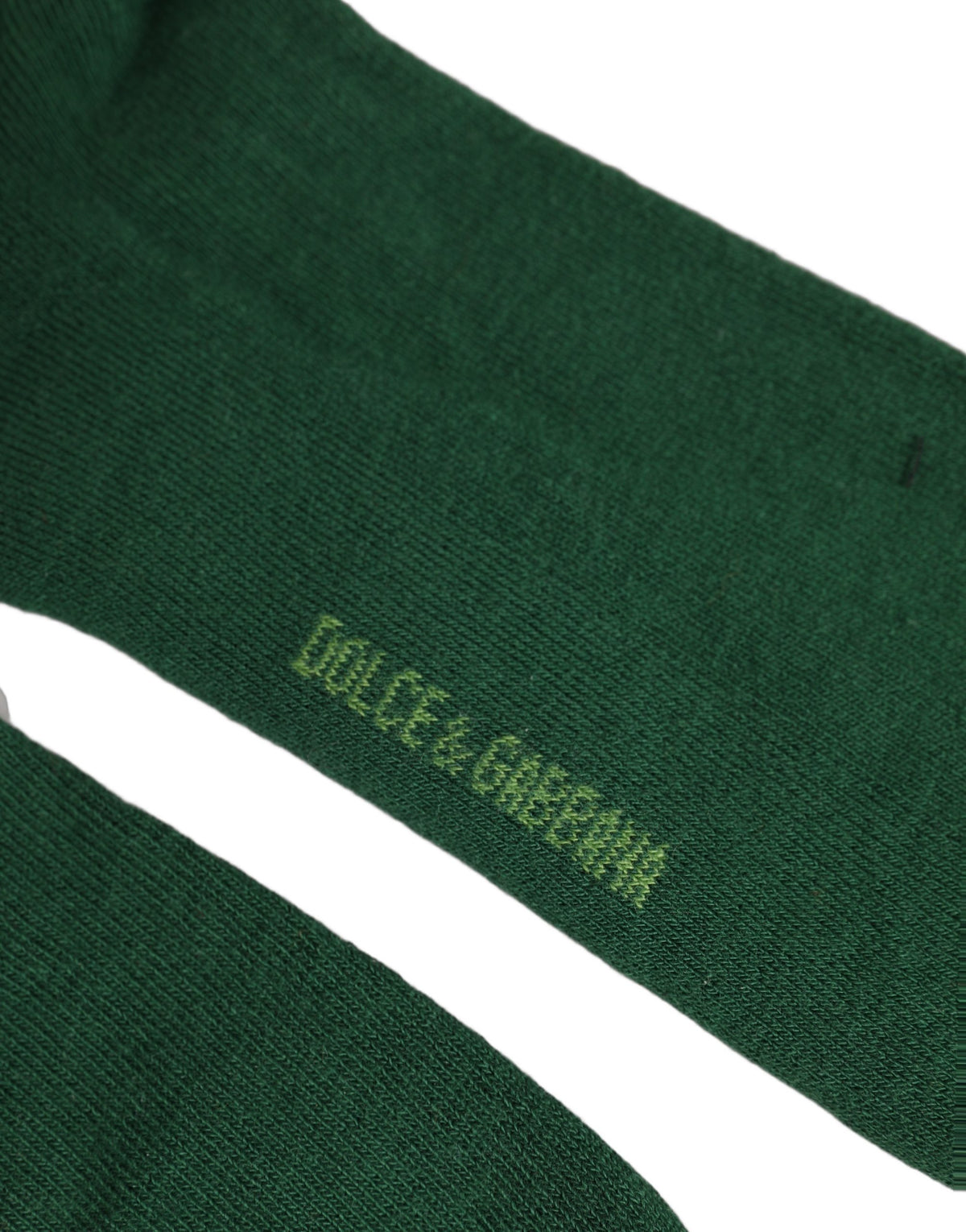 Socks by Dolce & Gabbana for women in nylon cotton & calf leather green & jacquard features a snug silhouette, artfully capturing the essence of the snug Women's Nylon Cotton & Calf Leather Socks design for a sophisticated look.