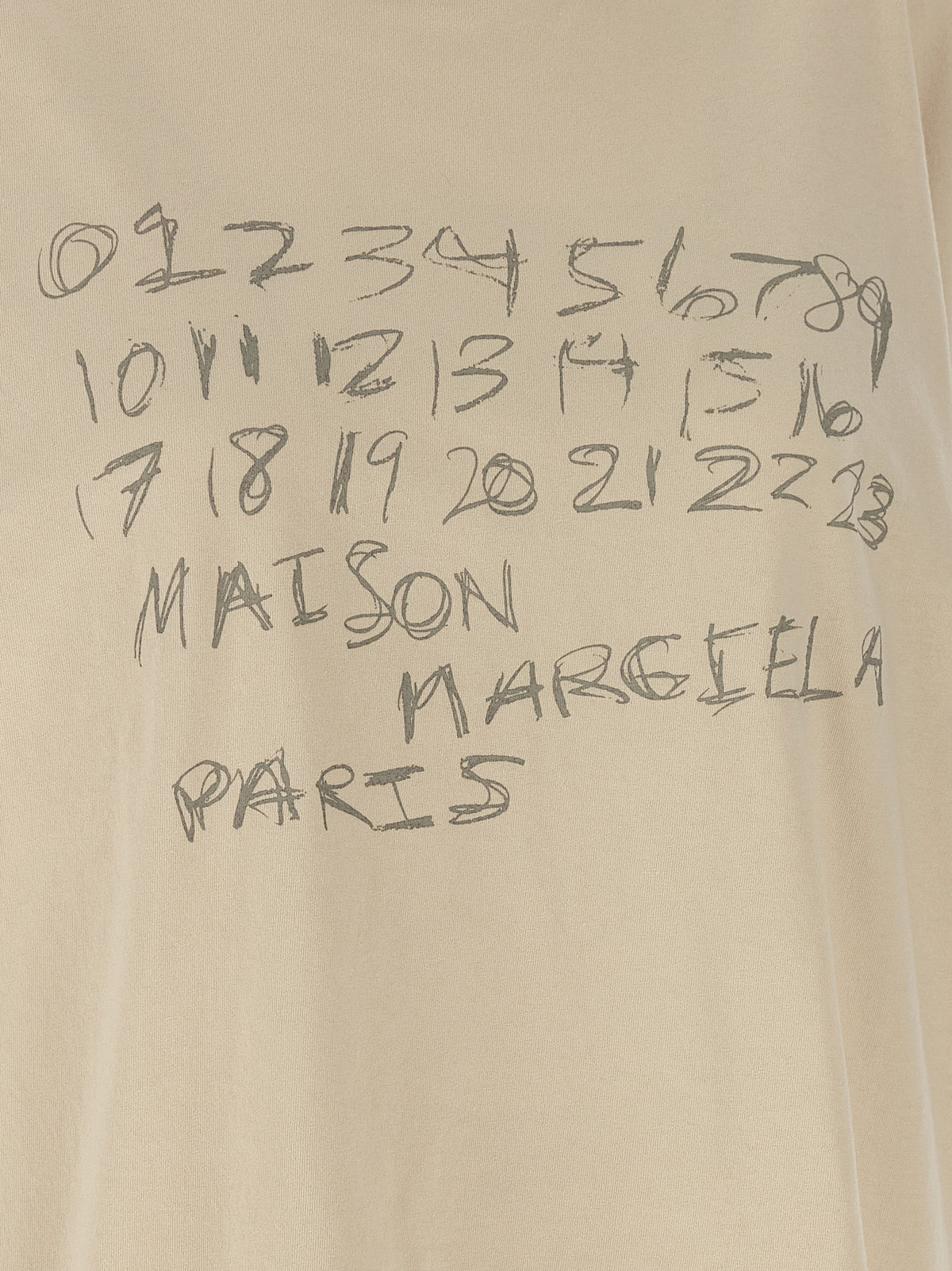 T-Shirt by Maison Margiela for women in cotton beige, signature & print showcases a unassuming silhouette, artfully detailed with a refined and unassuming for a sophisticated, contemporary look.