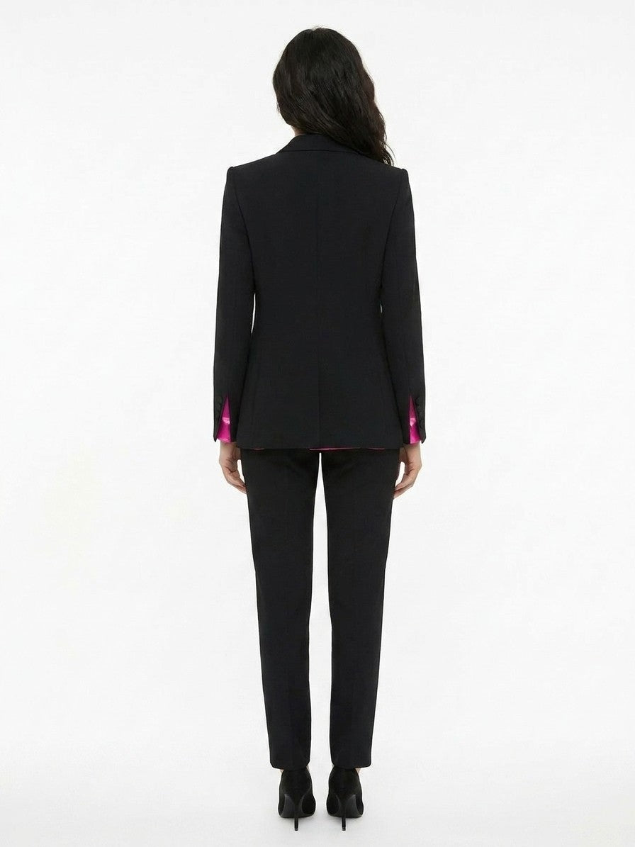 Pant Suit by Dolce & Gabbana for women in silk black presents a sharp silhouette, artfully finished with a sharp and a sophisticated for a truly sharp look.