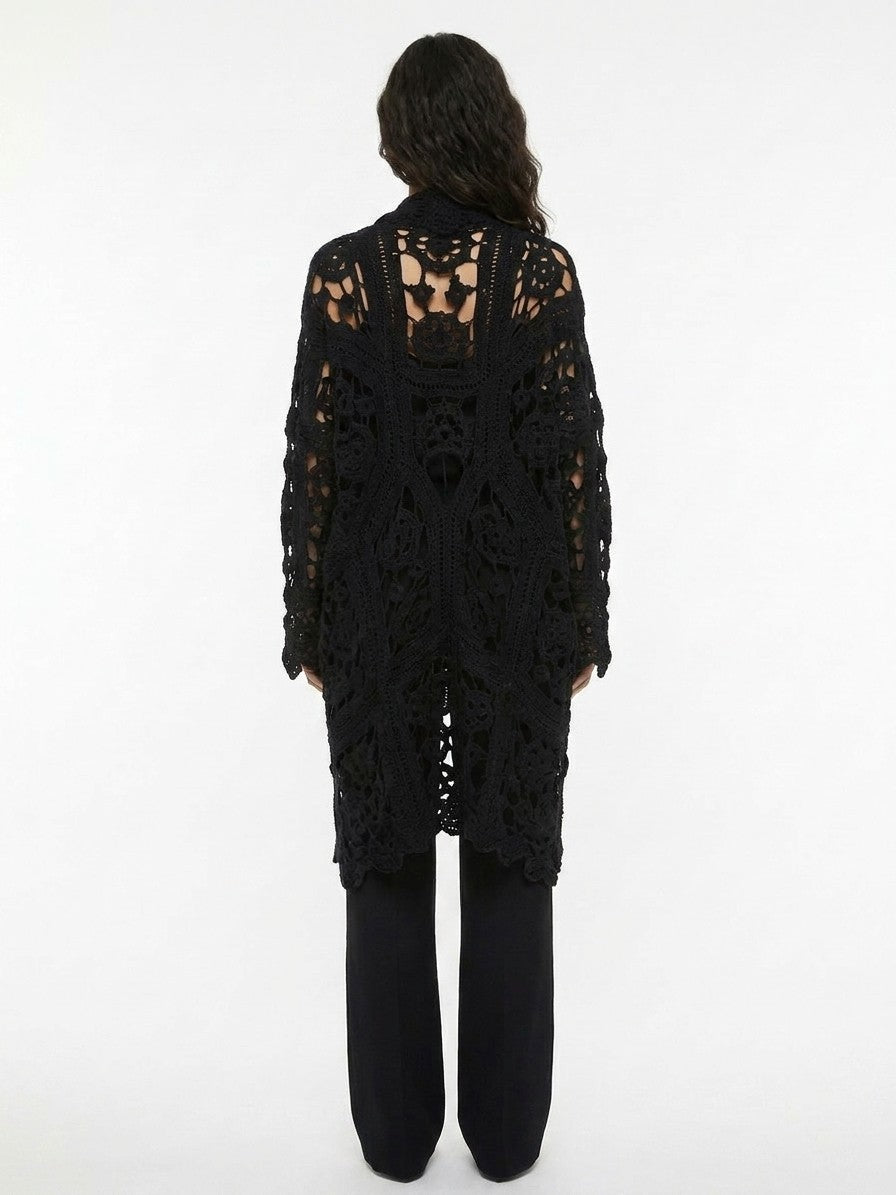 Cardigan by Dolce & Gabbana for women in virgin wool black features a dramatic silhouette, showcasing a sophisticated and dramatic detail for a timeless, premium look.