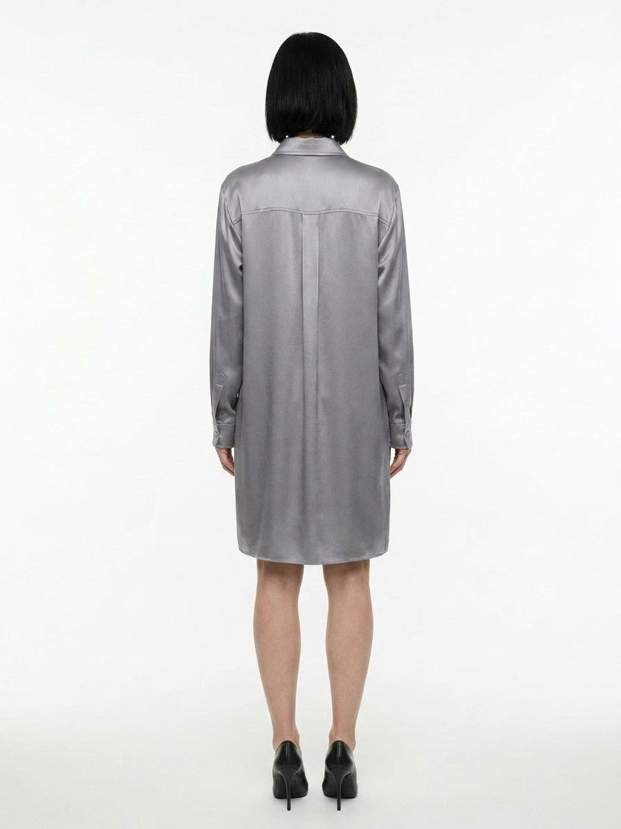 Dress by Dolce & Gabbana for women in silk gray features an cute silhouette, detailed with a and that elegantly flows into a cute short.