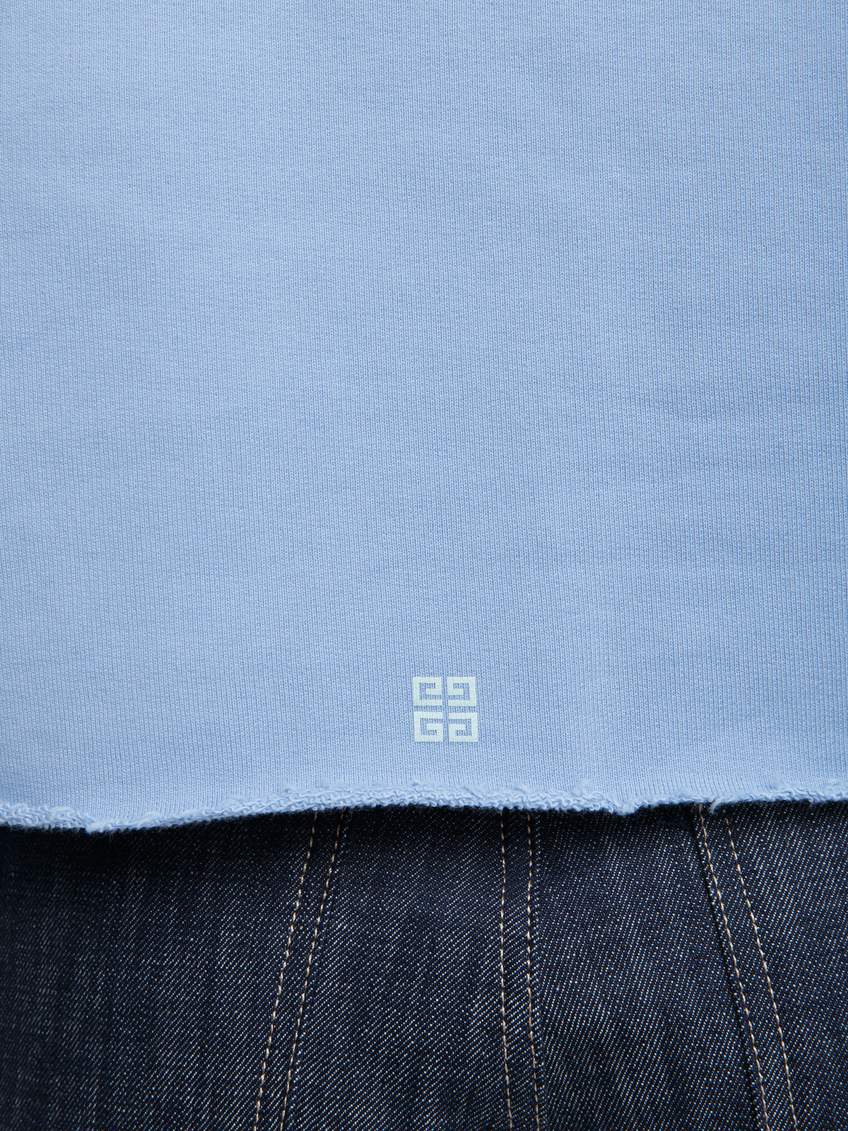 Sweatshirt Hoodie by Givenchy for women in cotton blue features an avant-garde silhouette, showcasing a sophisticated and detail for a truly avant-garde finish.