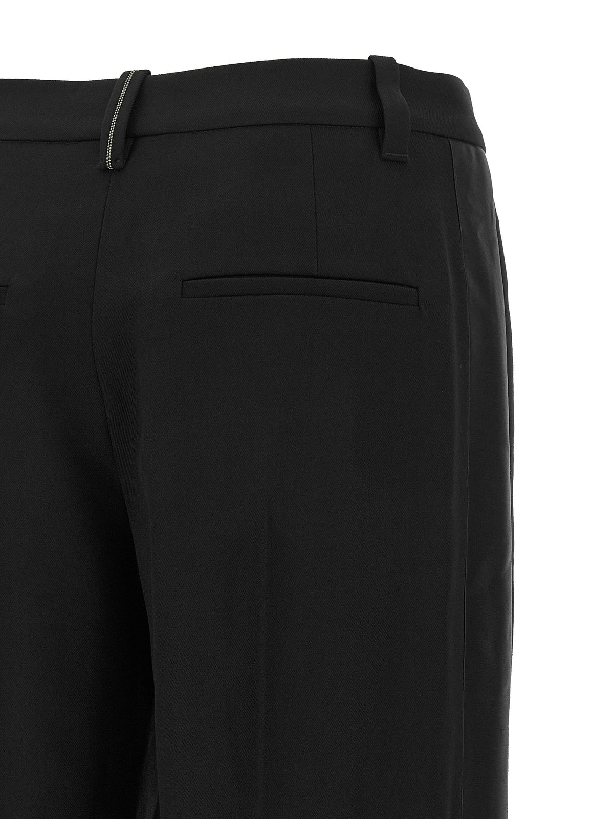 Trousers by Brunello Cucinelli for women in virgin wool black & signature presents a perennial silhouette, meticulously tailored with a straight-leg & wide cut, long finish, and an elegant .